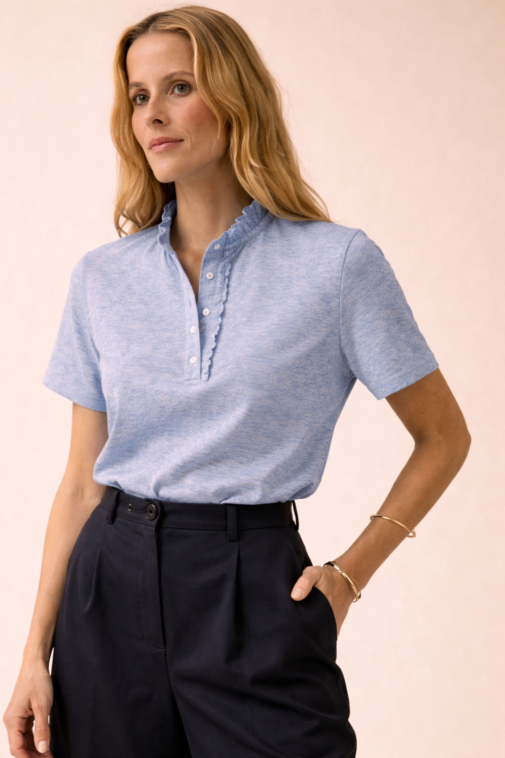Polo maille piquée col volanté femme