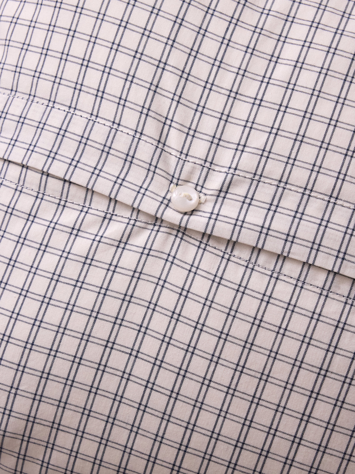 Housse de coussin petits carreaux brodée