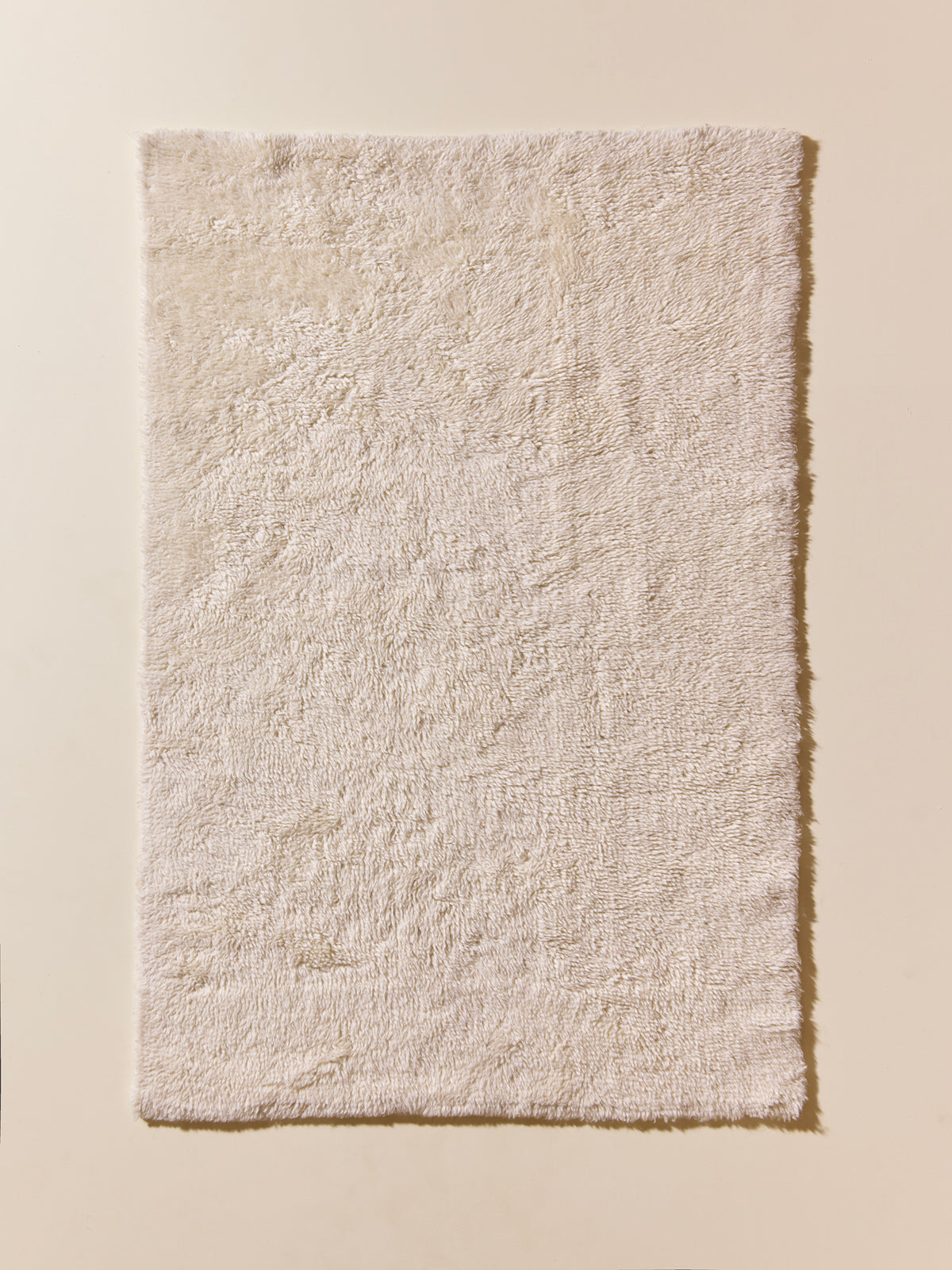 Petit tapis poils longs pure laine