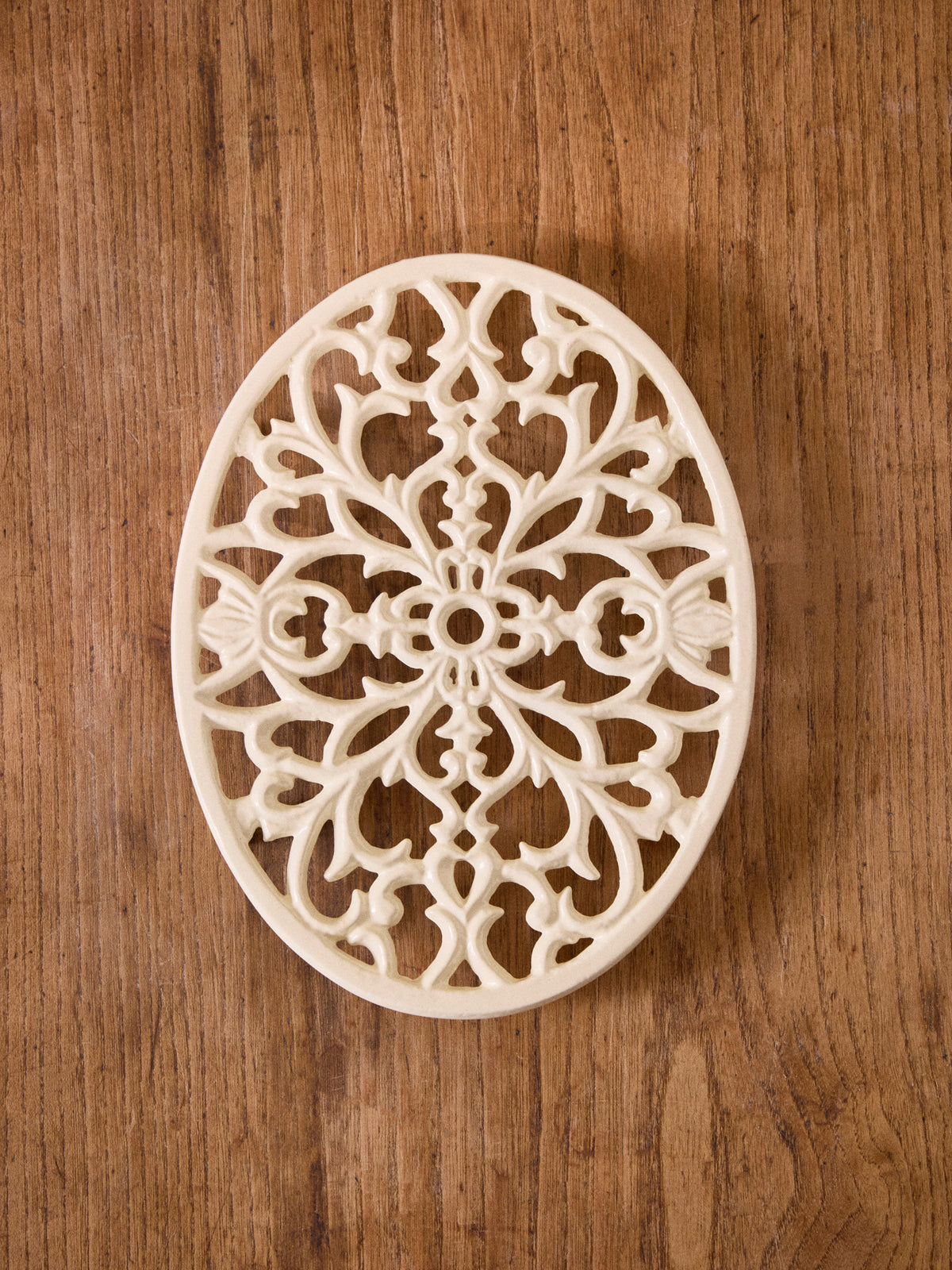 Dessous de plat oval en fonte
