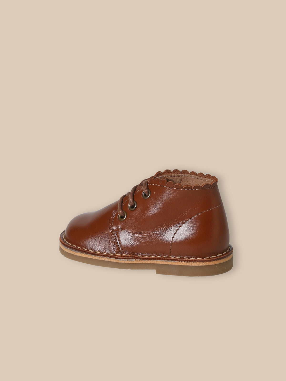 Bottines festonnées en cuir bébé