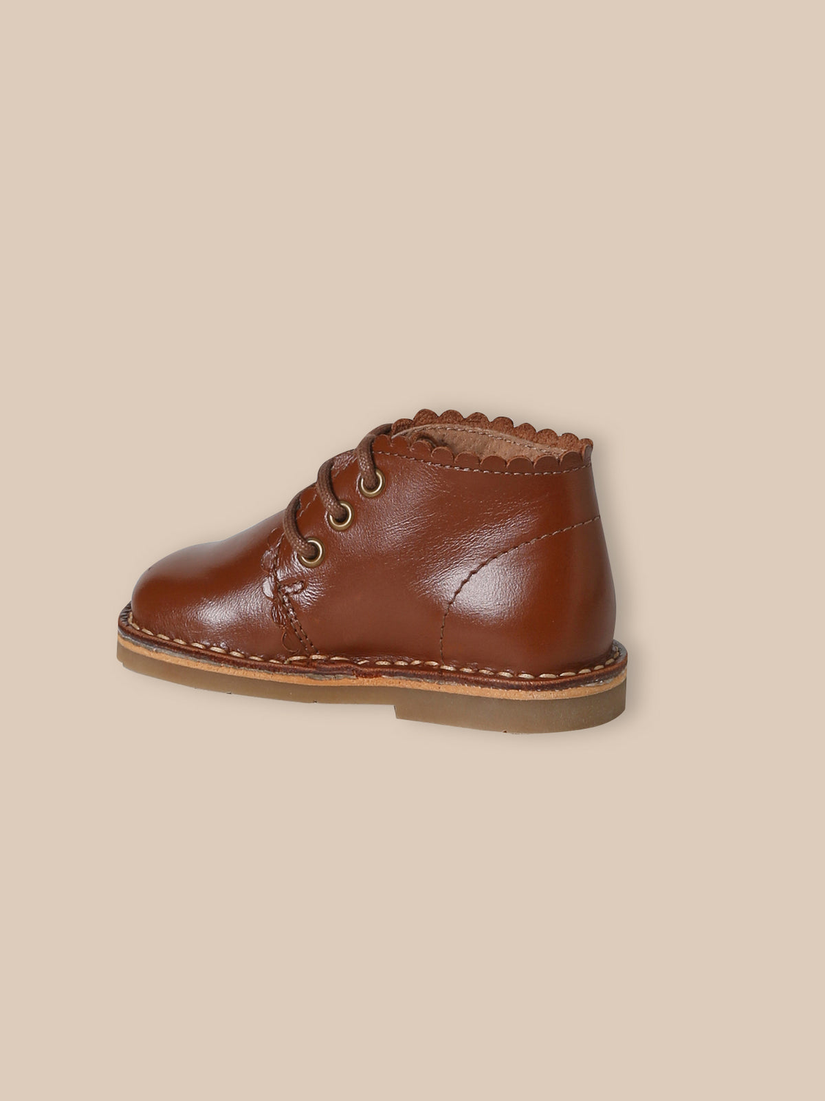Bottines festonnées en cuir bébé