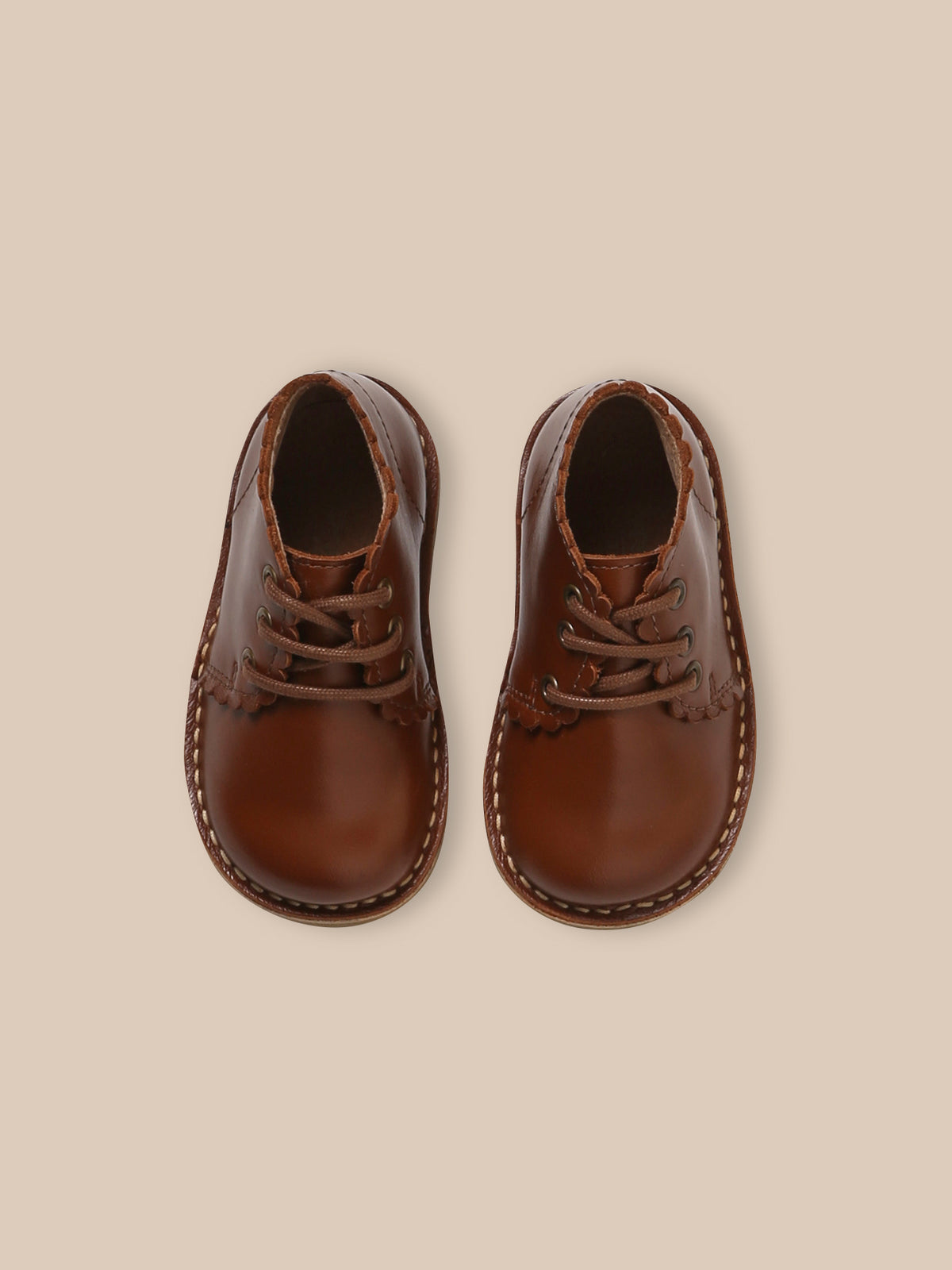 Bottines festonnées en cuir bébé